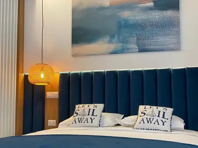 Letto o letti in una camera di GoConcept Studio Sardegna