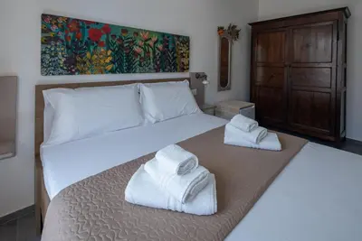 Letto o letti in una camera di Sul Corso Affittacamere