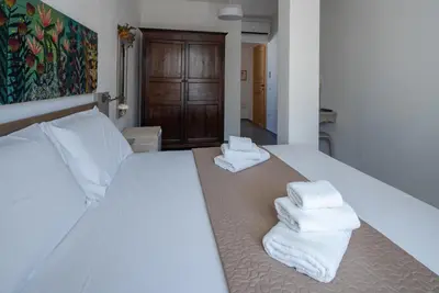 Letto o letti in una camera di Sul Corso Affittacamere