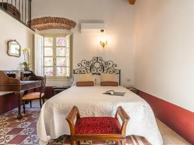 Letto o letti in una camera di PALAZZO CHERCHI