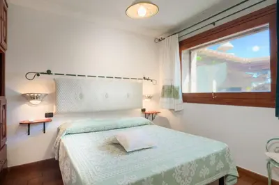 Letto o letti in una camera di Suite Suliana