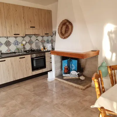 Cucina o angolo cottura di Le Farfalle Appartamento in villa trifamiliare
