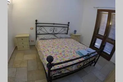Letto o letti in una camera di Residenza Sardegna da amare