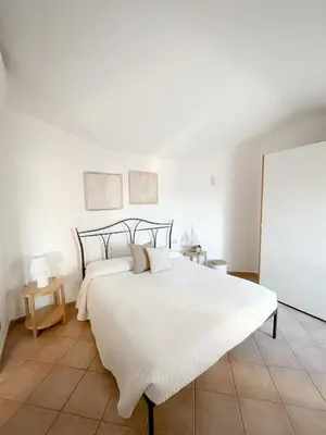 Letto o letti in una camera di Casa Carmen - Attico vista mare