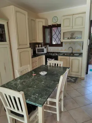 Cucina o angolo cottura di Residence Cala Moresca 15