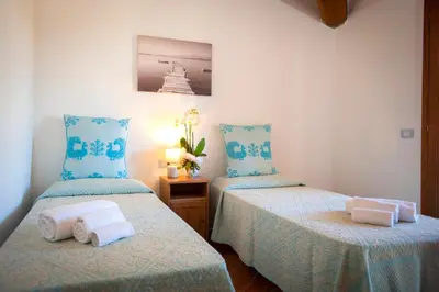 Letto o letti in una camera di Villa Isuledda Lux
