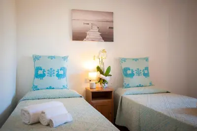 Letto o letti in una camera di Villa Isuledda Lux