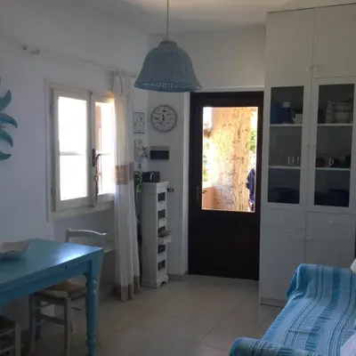 Cucina o angolo cottura di Villa Vera trifamigliare con ingresso diretto 20 mt al mare clima wi-fi bbq