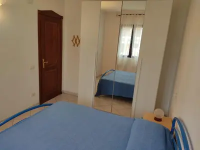 Letto o letti in una camera di Appartamento a La Caletta