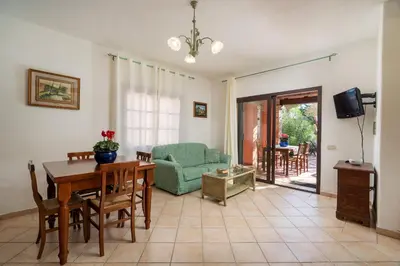 Area soggiorno di Porto San Paolo Apartments