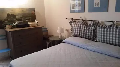Letto o letti in una camera di La casa di Camilla a Punta Molara