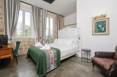 Letto o letti in una camera di Kemani Villa Sara - Boutique Guest House