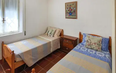 Letto o letti in una camera di Cozy Home In Orgosolo