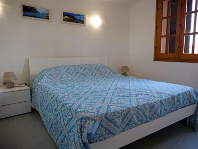 Letto o letti in una camera di grandi famiglie o comitive 150 mt spiaggia budoni affitti