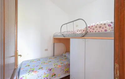 Letto o letti in una camera di Amazing Apartment In Porto San Paolo