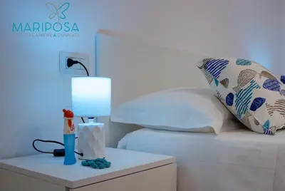 Letto o letti in una camera di Affittacamere Mariposa