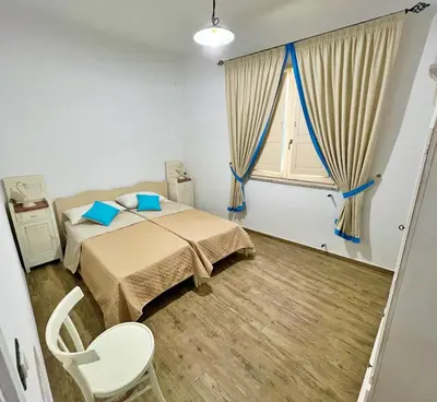 Letto o letti in una camera di Sa Domo de Tzia Elene