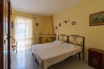 Letto o letti in una camera di Le Case di Mara - Monte Petrosu House
