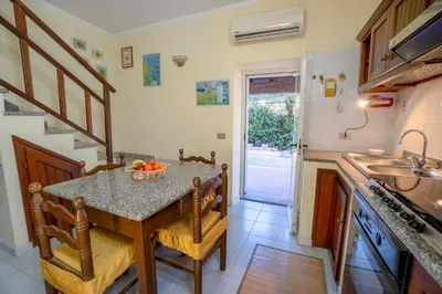 Cucina o angolo cottura di Le Case di Mara - Monte Petrosu House