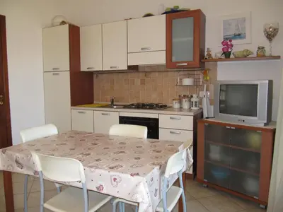 Cucina o angolo cottura di Bilocale Vista Mare Le Residenze
