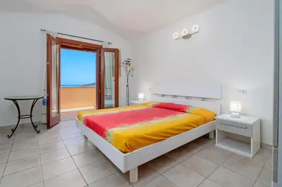 Letto o letti in una camera di Villetta Lutturai