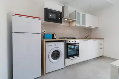 Cucina o angolo cottura di Appartamento Perla Bianca, con WiFi e Air Con