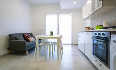 Cucina o angolo cottura di Appartamento Perla Verde, WiFi e Air Con