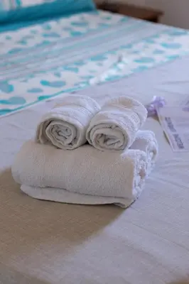 Letto o letti in una camera di Casa Vacanze da PatriciaD
