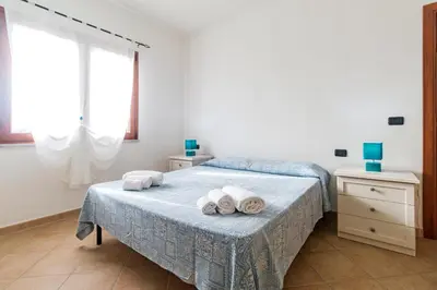 Letto o letti in una camera di Residence La Corte Di Anastasia