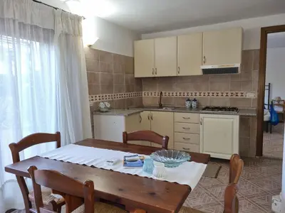 Cucina o angolo cottura di *Appartamento con ampia Veranda vicino al mare *