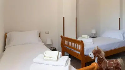 Letto o letti in una camera di Casa Dei Lecci - Cala Gonone