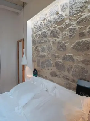 Letto o letti in una camera di In Centro da Viola - Eco Design Rooms