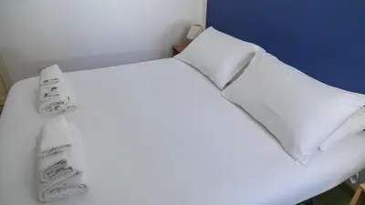 Letto o letti in una camera di Appartamenti Taloro AB IUN Q3273