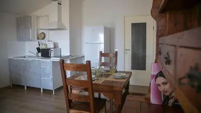 Cucina o angolo cottura di Appartamenti Taloro AB IUN Q3273