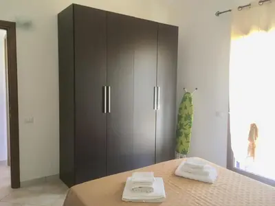 Letto o letti in una camera di Residence S’Oggiastrone