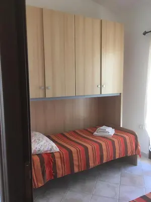 Letto o letti in una camera di Residence S’Oggiastrone