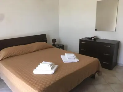 Letto o letti in una camera di Residence S’Oggiastrone
