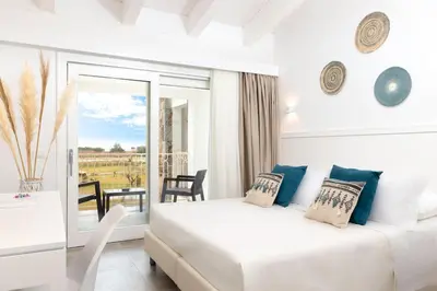 Letto o letti in una camera di Hotel S'arena Beach