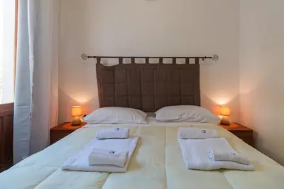 Letto o letti in una camera di Casa Riccio