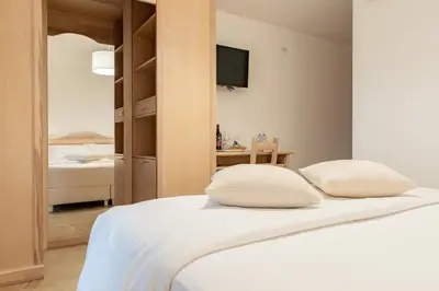 Letto o letti in una camera di MARISTESI