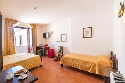 Letto o letti in una camera di Hotel Il Querceto