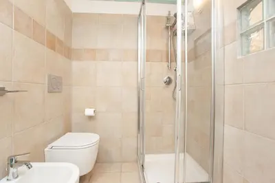Bagno di Porto Coda Cavallo Beach House a 300 mt dal mare, con terrazza panoramica