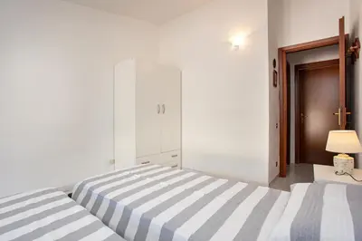 Letto o letti in una camera di Rosa dei Venti