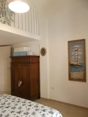 Letto o letti in una camera di La Vela suite