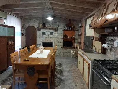 Cucina o angolo cottura di B&B Sa Madalena a Dorgali-IUN E4918