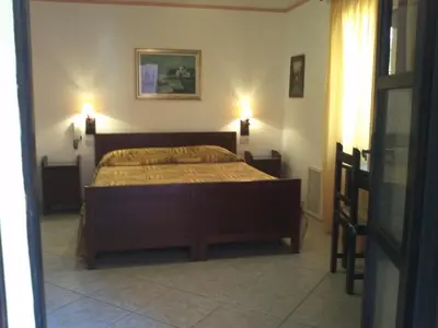 Letto o letti in una camera di Hotel Abbaruja