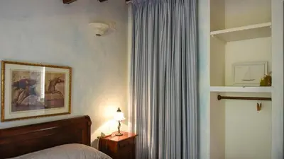 Letto o letti in una camera di Casa Ortobene Arte