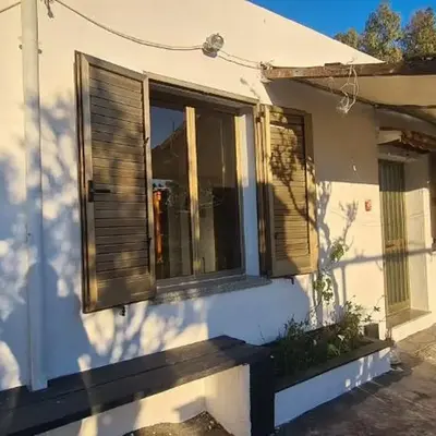 Cosy home with private parking by the sea
