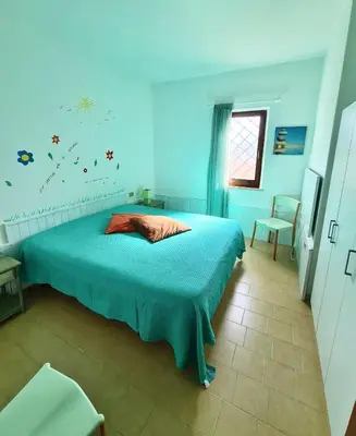 Letto o letti in una camera di ISS Travel, Sa Chessa - ground floor 1-bedroom apartment