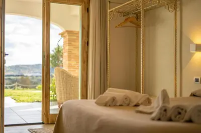Letto o letti in una camera di HOTEL Essenza di Mirto